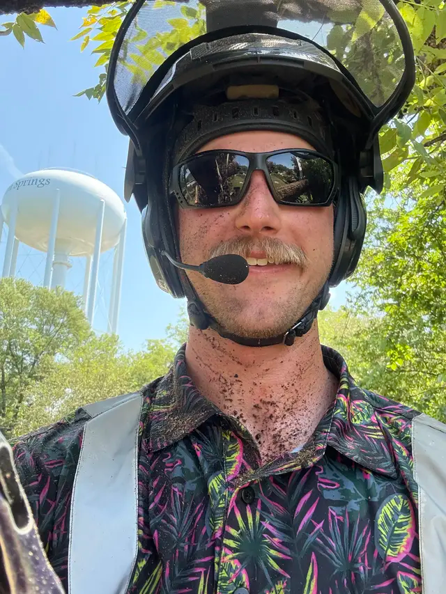 Josh Campbell wearing a helmet and tree gear